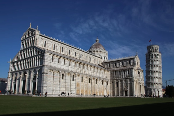 The Leaning Tower of Pisa, cathedral, and landscape.