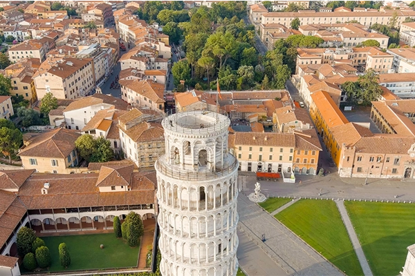 Pisa, Italy. Famous Leaning Tower and Pisa Cathedral in Piazza dei Miracoli. Summer. Morning hours, Aerial View